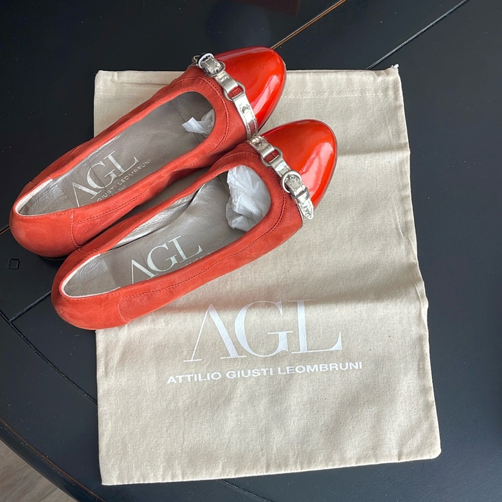 AGL. Very gently worn. Excellent condition. Orange Suede and patent cap toe.